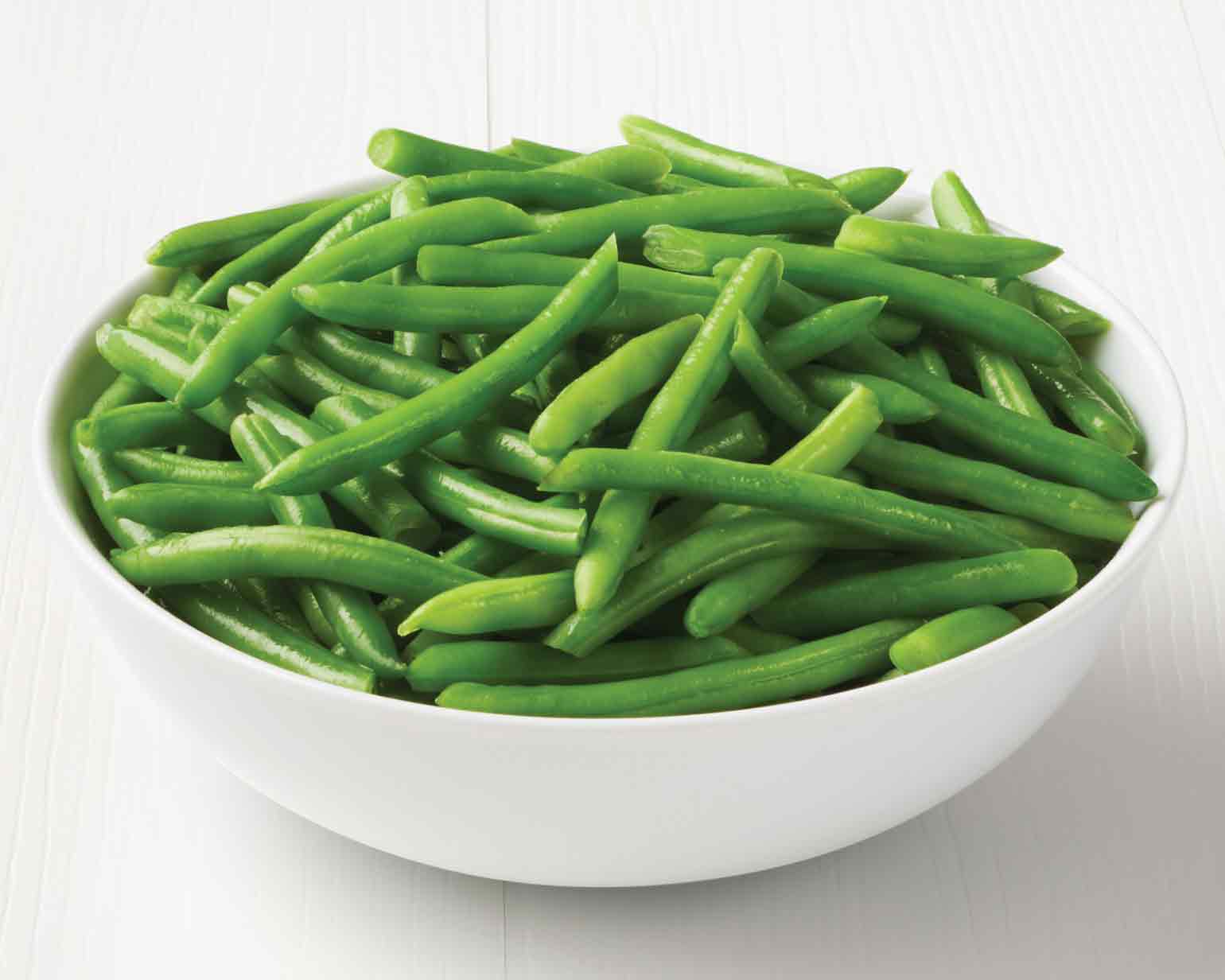 "Fresh green beans in a bowl, crisp and nutritious, perfect for healthy recipes"
"Close-up of vibrant green beans, rich in vitamins and fiber, ideal for salads or side dishes"
"Steamed green beans with a bright green color, a healthy addition to any meal"
"Freshly harvested green beans piled on a wooden table, versatile and packed with nutrients