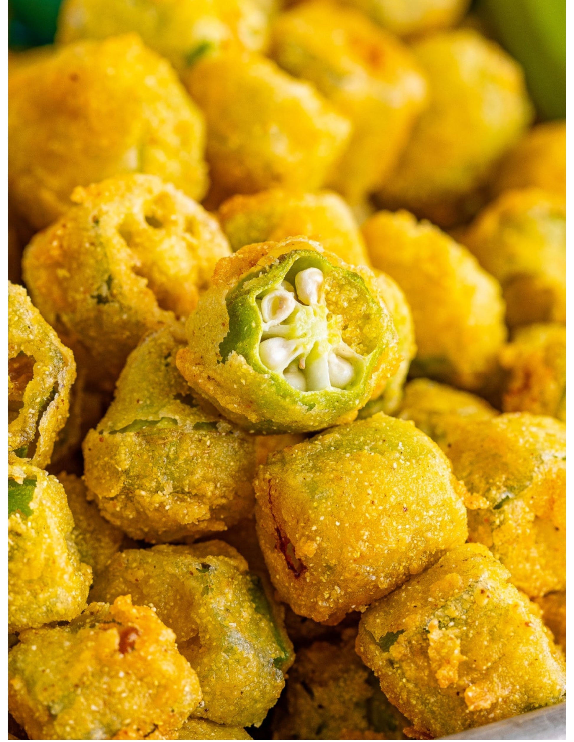 Golden breaded okra pieces, perfectly seasoned and crisp, showcasing a crunchy coating with tender, flavorful okra inside. Ideal as a Southern-style side dish or a snack, this breaded okra is ready to add a satisfying crunch to any meal."