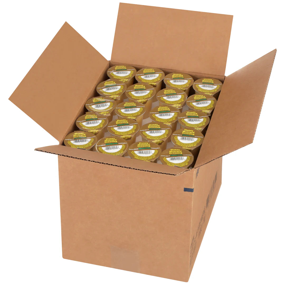 Open cardboard box filled with multiple containers of 1oz honey mustard dressings on a white background