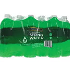 A six-pack of Molletta brand spring water bottles in a clear plastic clamshell package, showing bright green liquid inside.